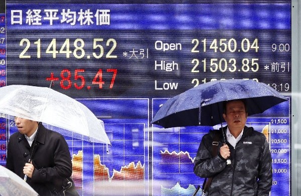 日経平均株価は21年ぶりの高値を更新（写真：共同通信社）