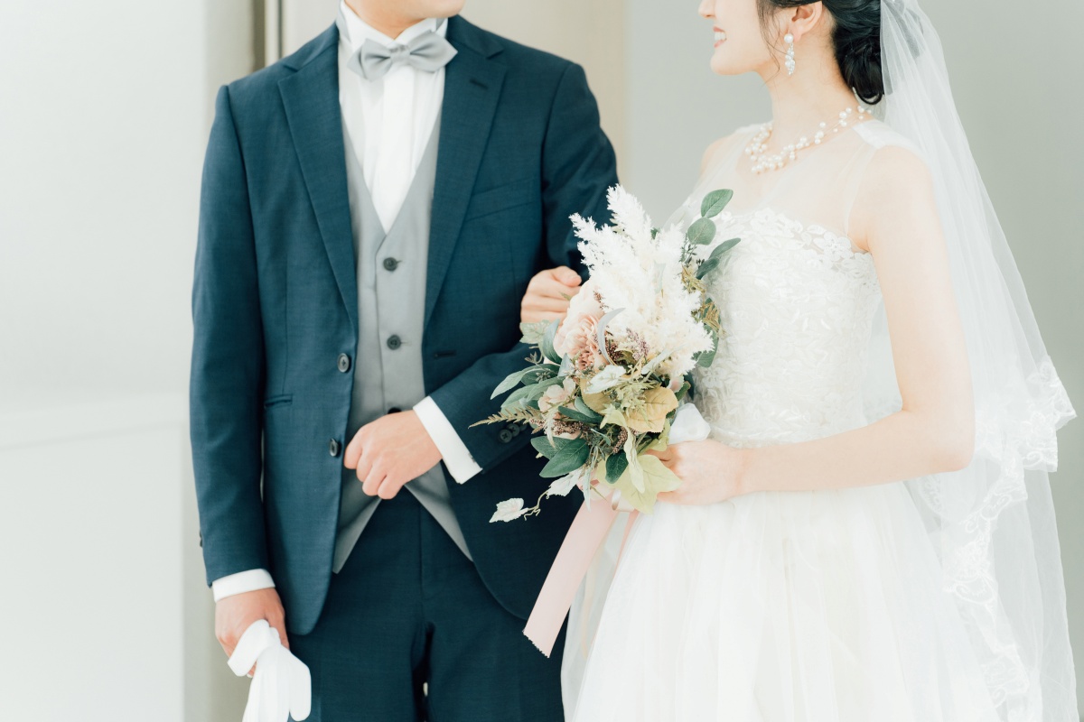 結婚式費用が最初の想定より高くなりがちなのはなぜ?(写真:イメージマート)