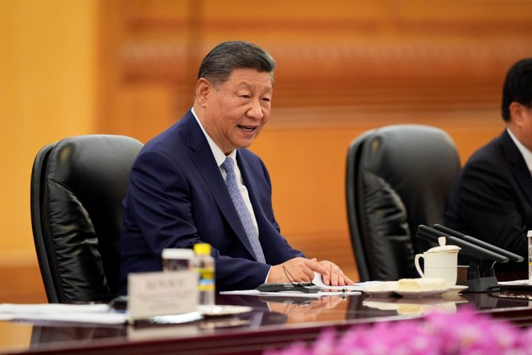 中国の環境政策目標を実現するために電力システムの研究開発は急務（習近平主席。Getty Images）